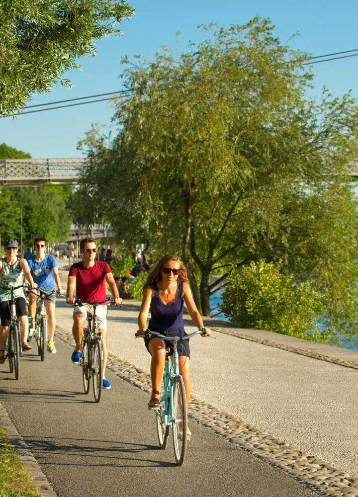 Cycling along the banks of the Rhône in Lyon